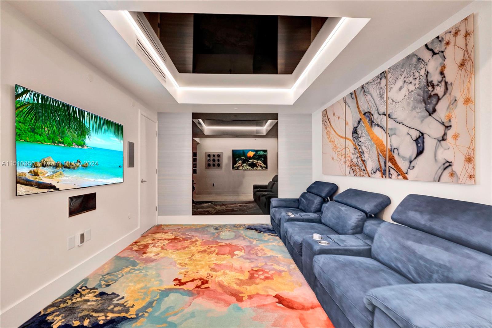 2101 South Surf Road, Unit 3C Hollywood, FL 33019 - Photo 6 of 23 a living room with furniture and a flat screen tv