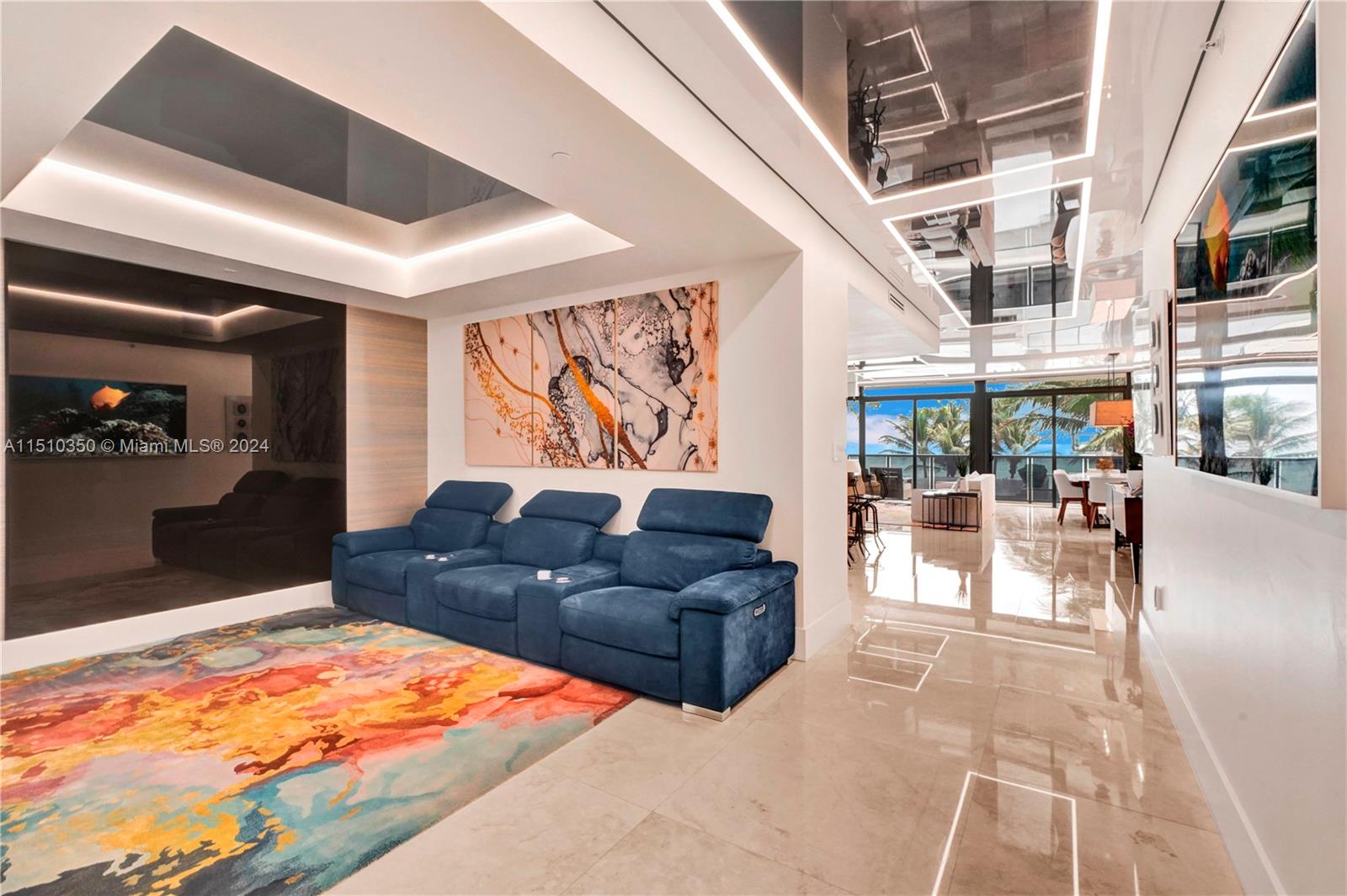 2101 South Surf Road, Unit 3C Hollywood, FL 33019 - Photo 8 of 23 a living room with furniture and a rug