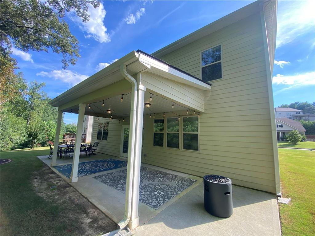 4870 Odum View Lane Cumming, GA 30040 - Photo 23 of 23 a front view of a house with a porch