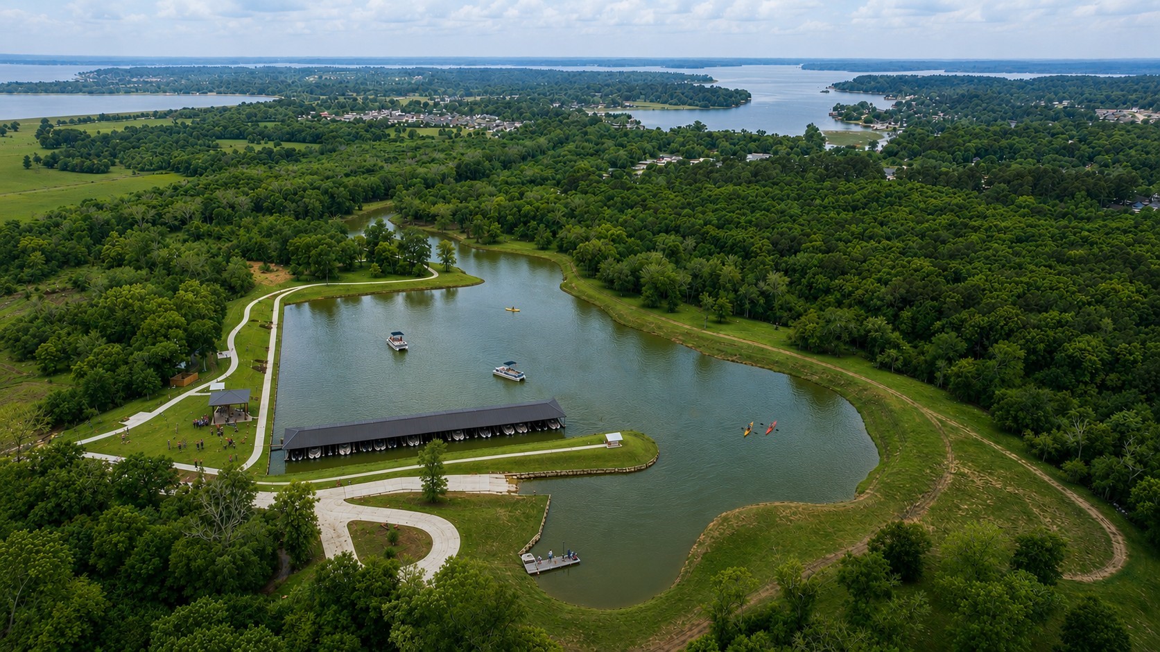 10035 Chester Rough Drive Willis, TX 77318 - Photo 8 of 12 A standout Chambers Creek amenity, the private marina and boat launch make enjoying Lake Conroe easy.