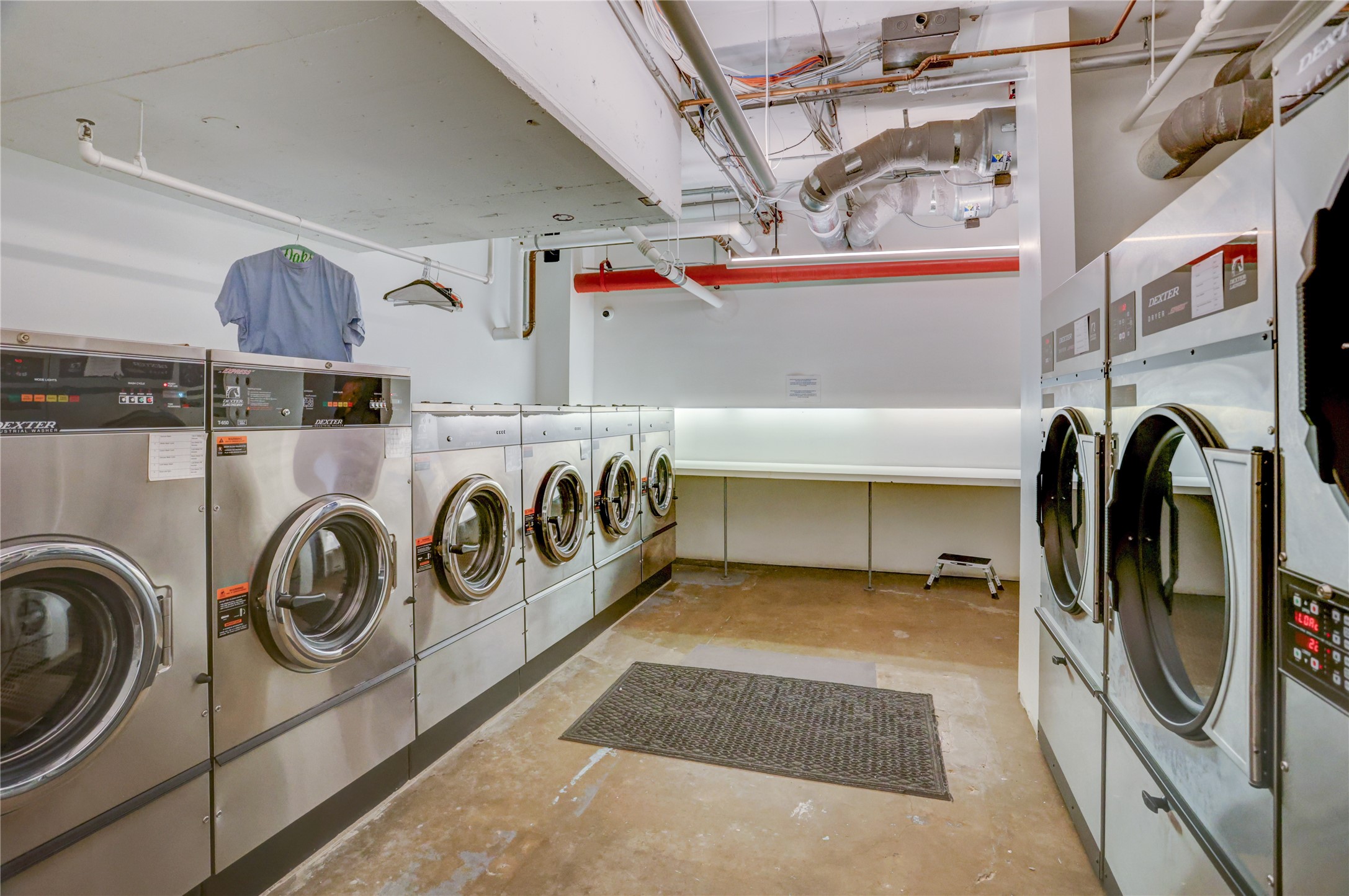 2701 Westheimer Road, Unit 12E Houston, TX 77098 - Photo 28 of 31 a utility room with dryer and washer