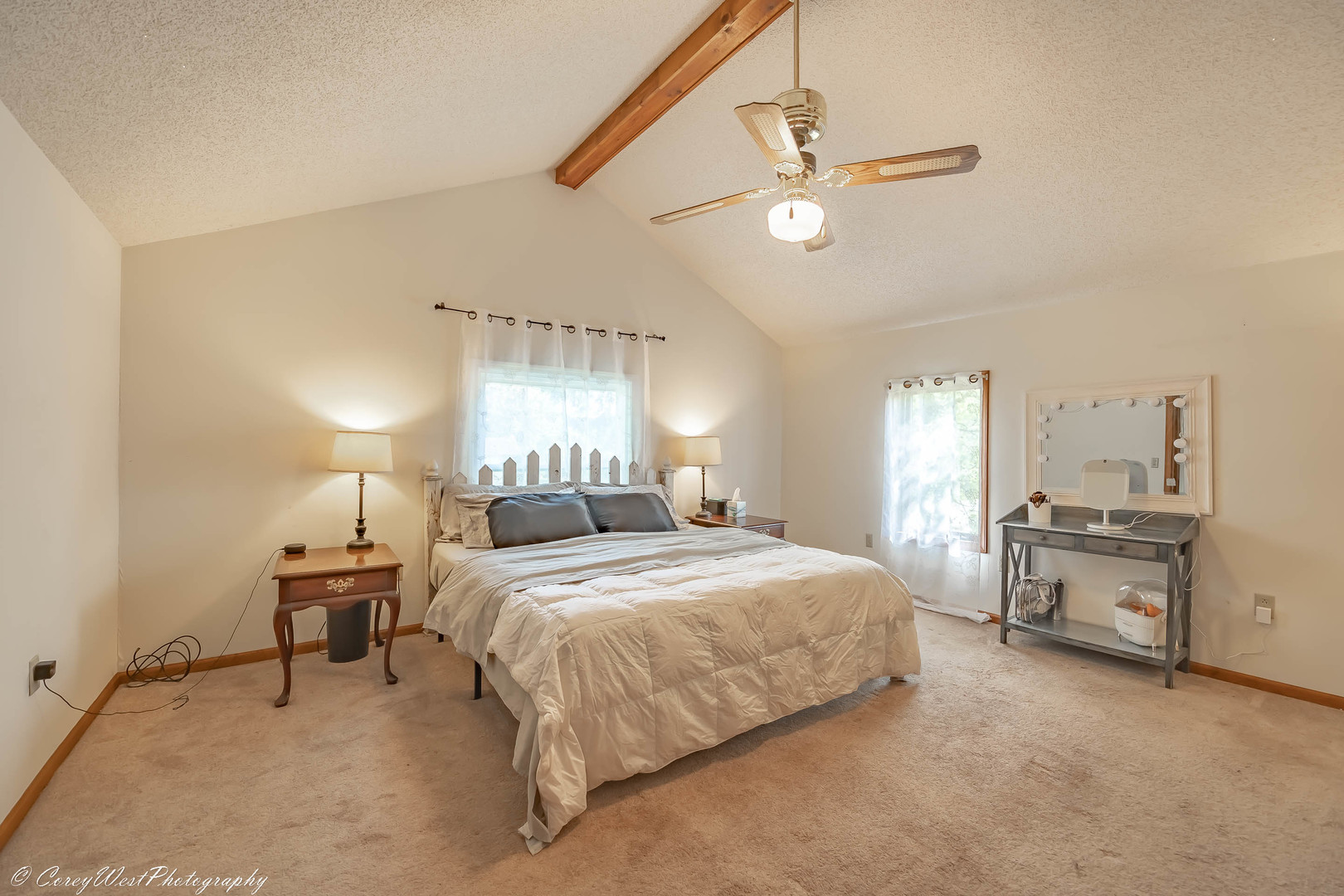 927 Thurlby Road Kingston, IL 60145 - Photo 12 of 21 a bedroom with a bed and a chandelier