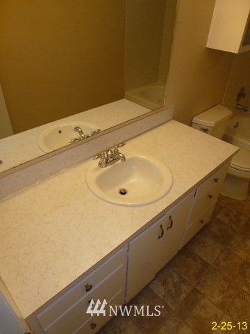 22010 7th Place West Bothell, WA 98021 - Photo 6 of 15 a bathroom with a sink and a vanity
