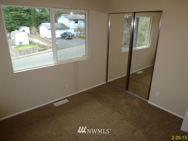 22010 7th Place West Bothell, WA 98021 - Photo 8 of 15 a view of empty room with window