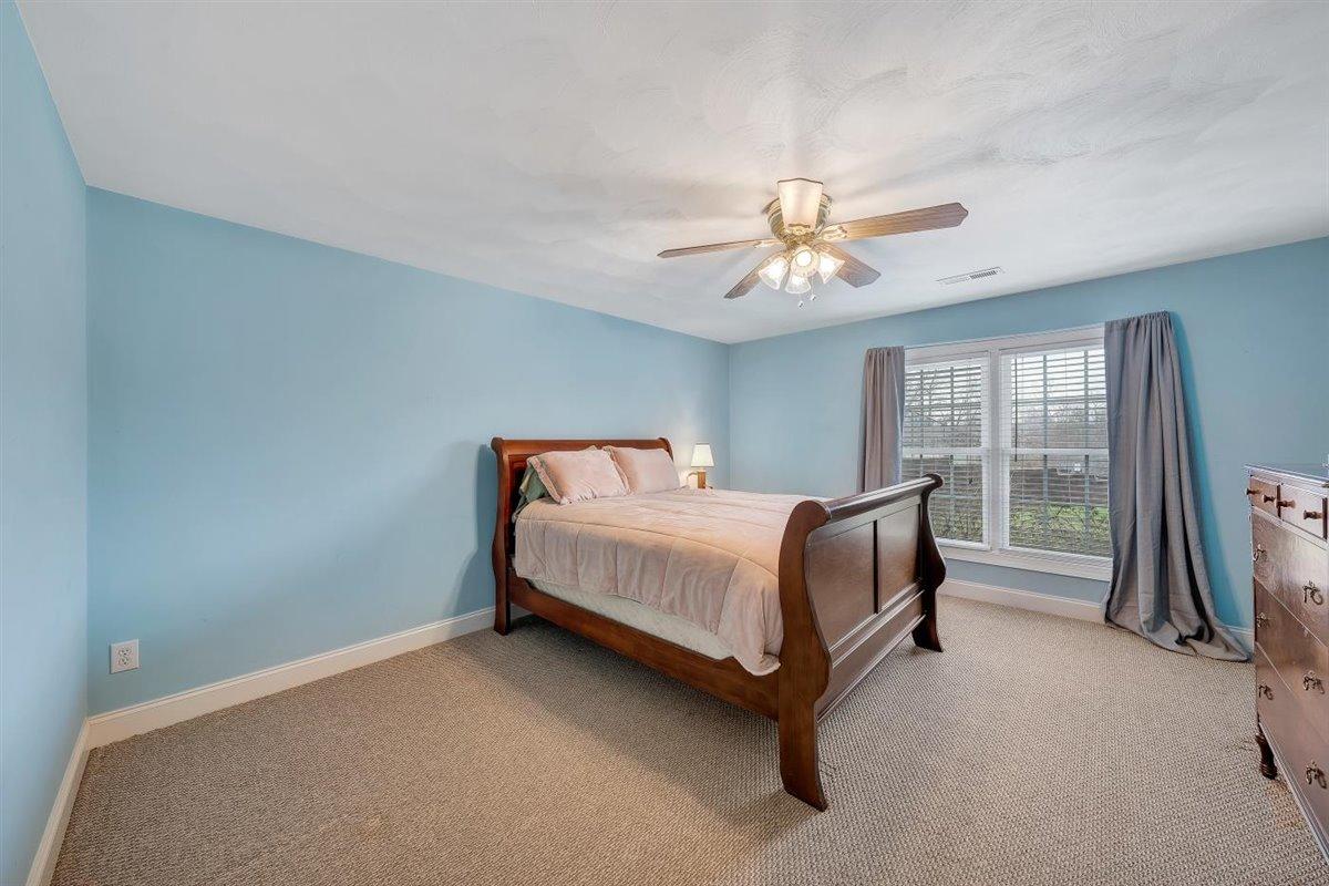 8500 Goodview Road Goodview, VA 24095 - Photo 22 of 44 a bed sitting in a room next to a window