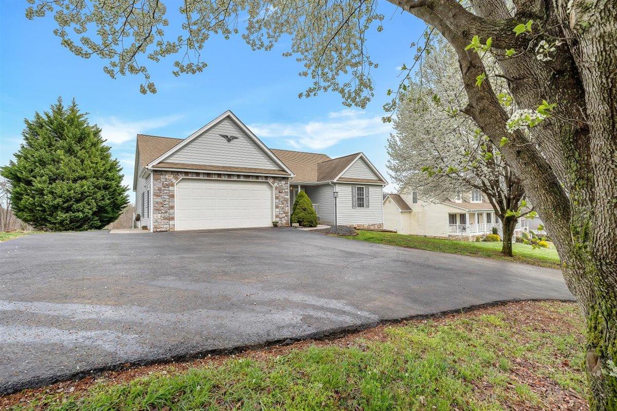 8500 Goodview Road Goodview, VA 24095 - Photo 9 of 44 a view of house with a yard and garage