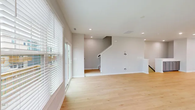 a view of a hallway with a large window