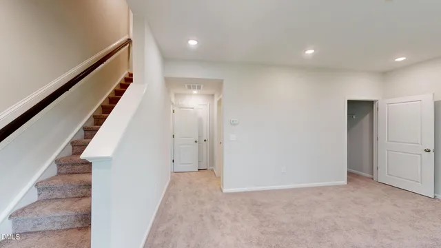 a view of an entryway with stairs