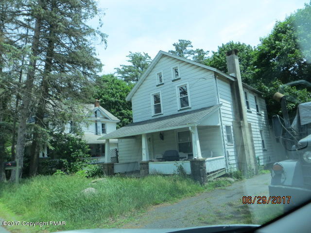 110 Firehouse Road Pocono Pines, PA 18350 - Photo 1 of 8 a view of a house with a yard
