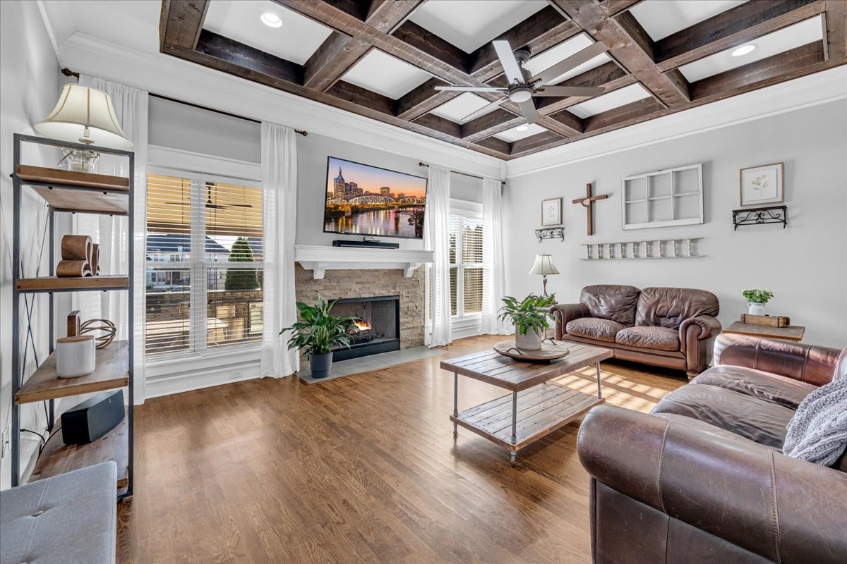1021 Alice Springs Circle Spring Hill, TN 37174 - Photo 17 of 86 a living room with furniture large window and a fireplace