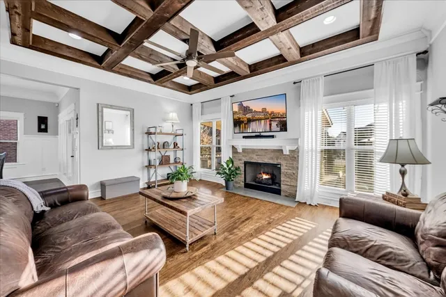 a view of a livingroom with furniture and wooden floor