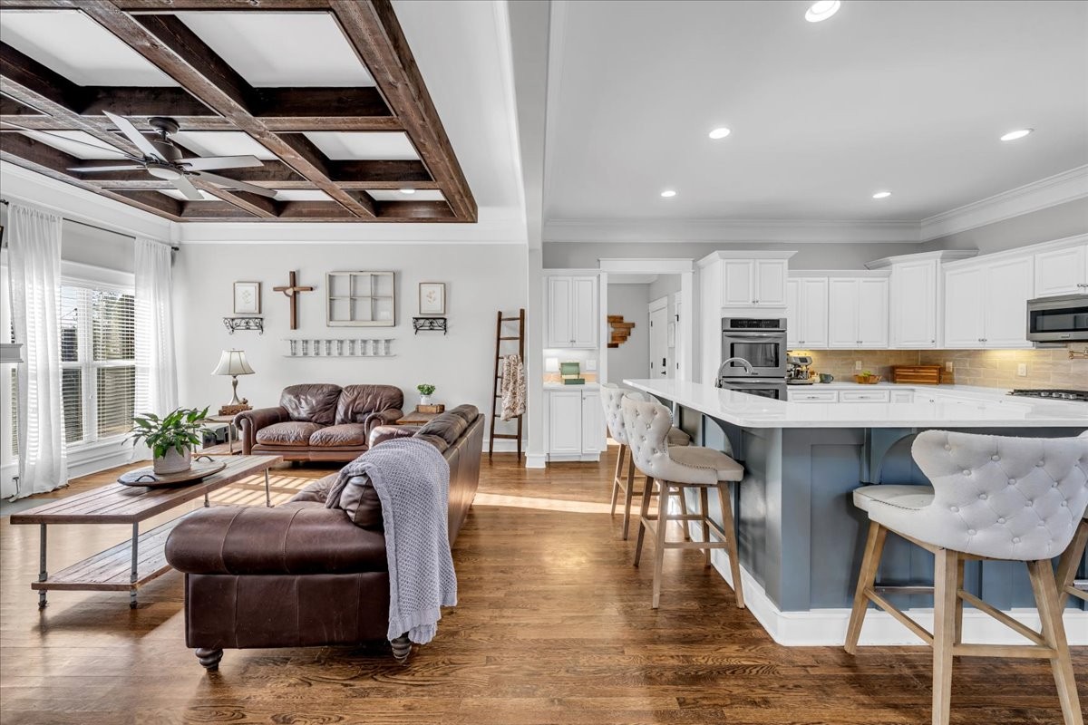 1021 Alice Springs Circle Spring Hill, TN 37174 - Photo 19 of 86 a living room with furniture and kitchen view