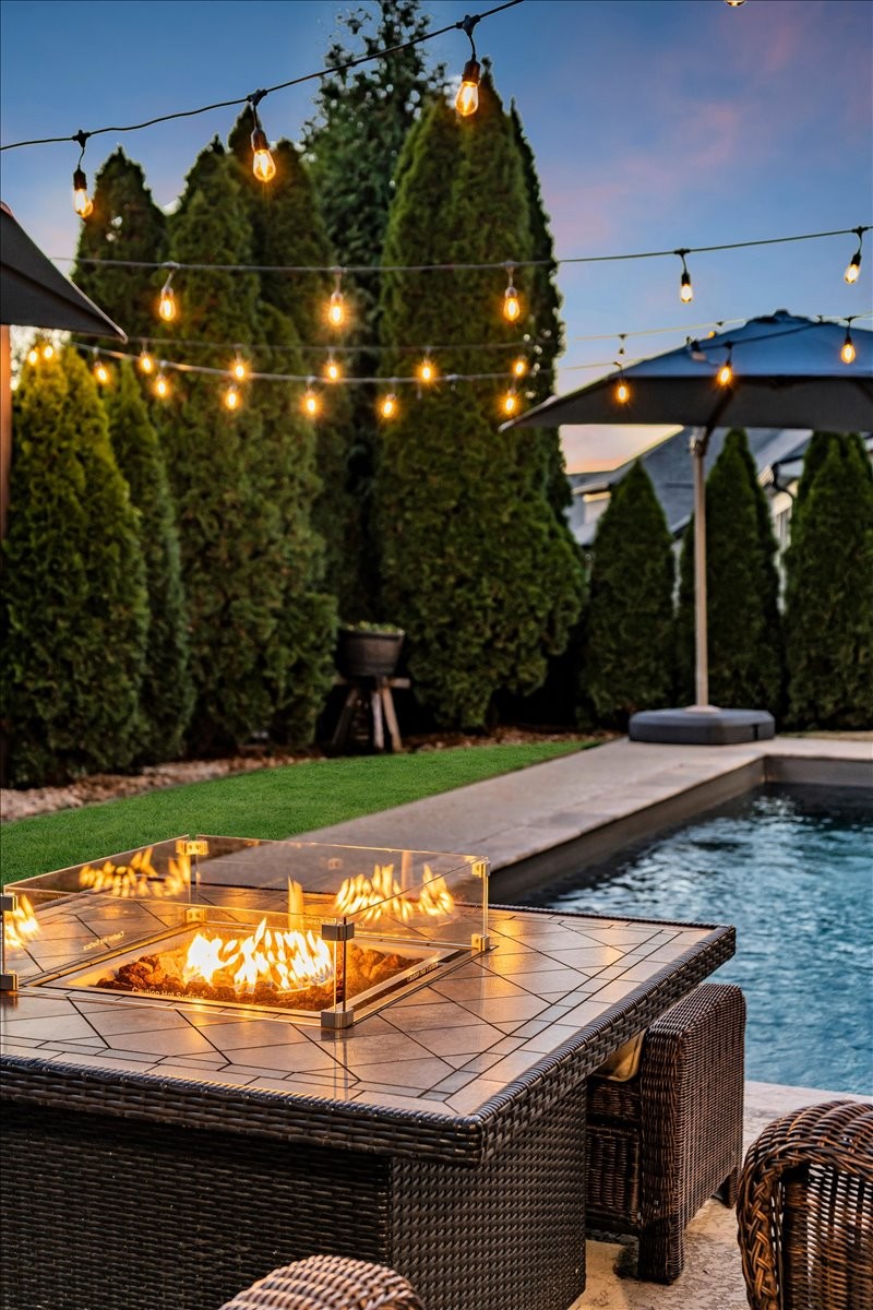 1021 Alice Springs Circle Spring Hill, TN 37174 - Photo 3 of 86 a view of swimming pool with a yard and sitting area