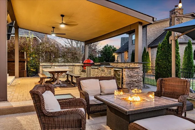 a outdoor living space with patio furniture and a potted plant