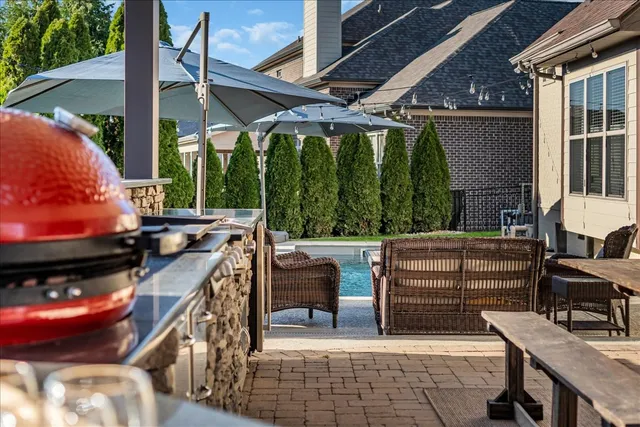 a living room with a fireplace with wooden floor