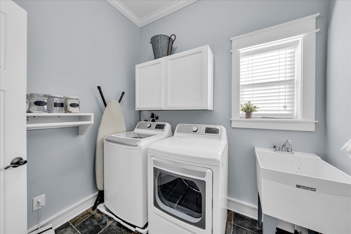 1021 Alice Springs Circle Spring Hill, TN 37174 - Photo 55 of 86 a utility room with dryer and washer