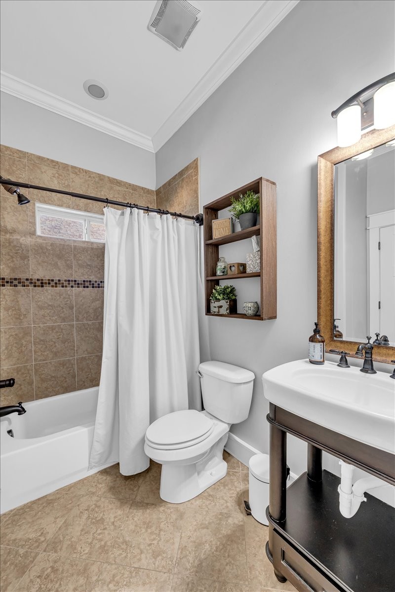 1021 Alice Springs Circle Spring Hill, TN 37174 - Photo 72 of 86 a bathroom with a sink toilet and shower