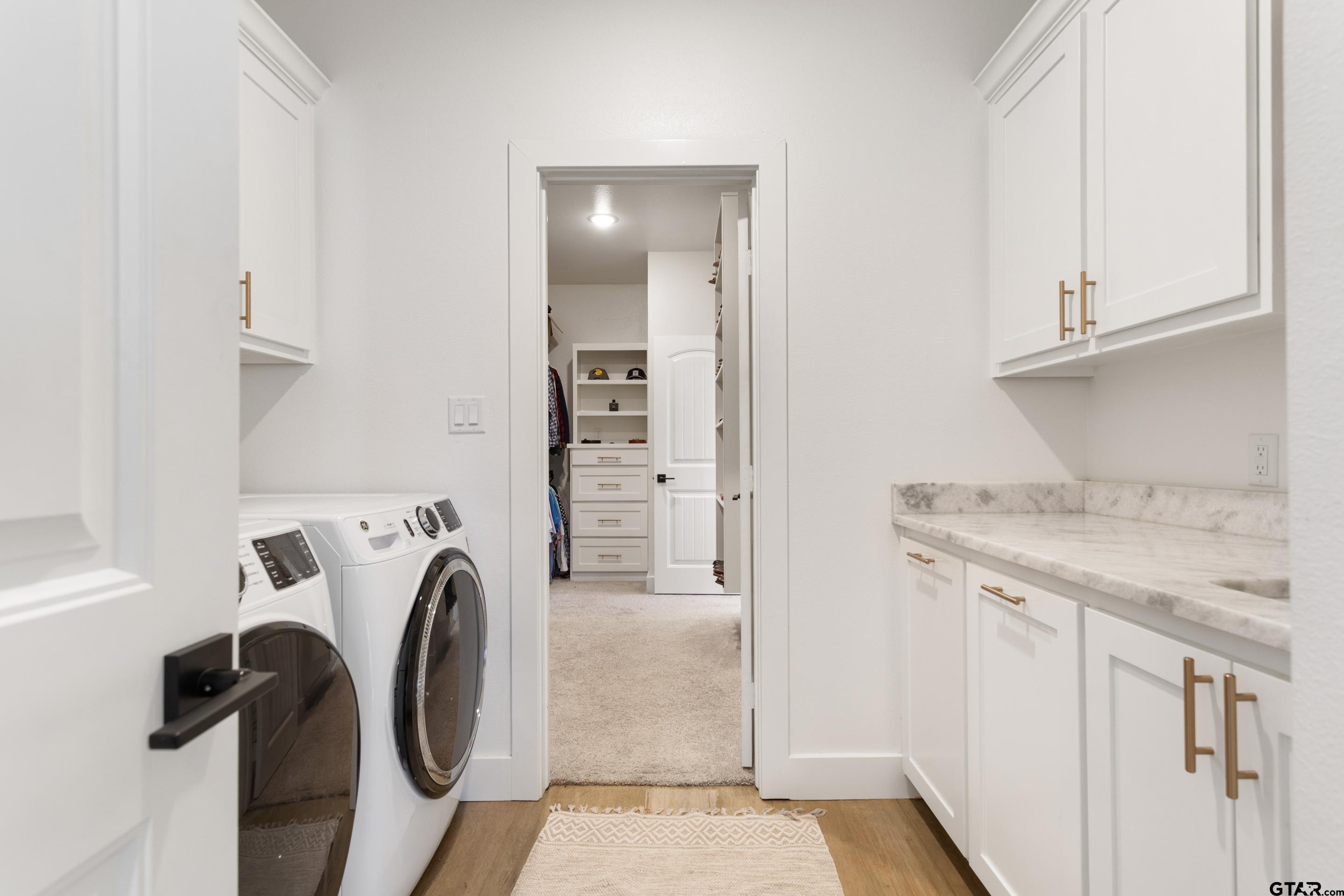 15344 County Road 196 Tyler, TX 75703 - Photo 21 of 48 a utility room with dryer and washer