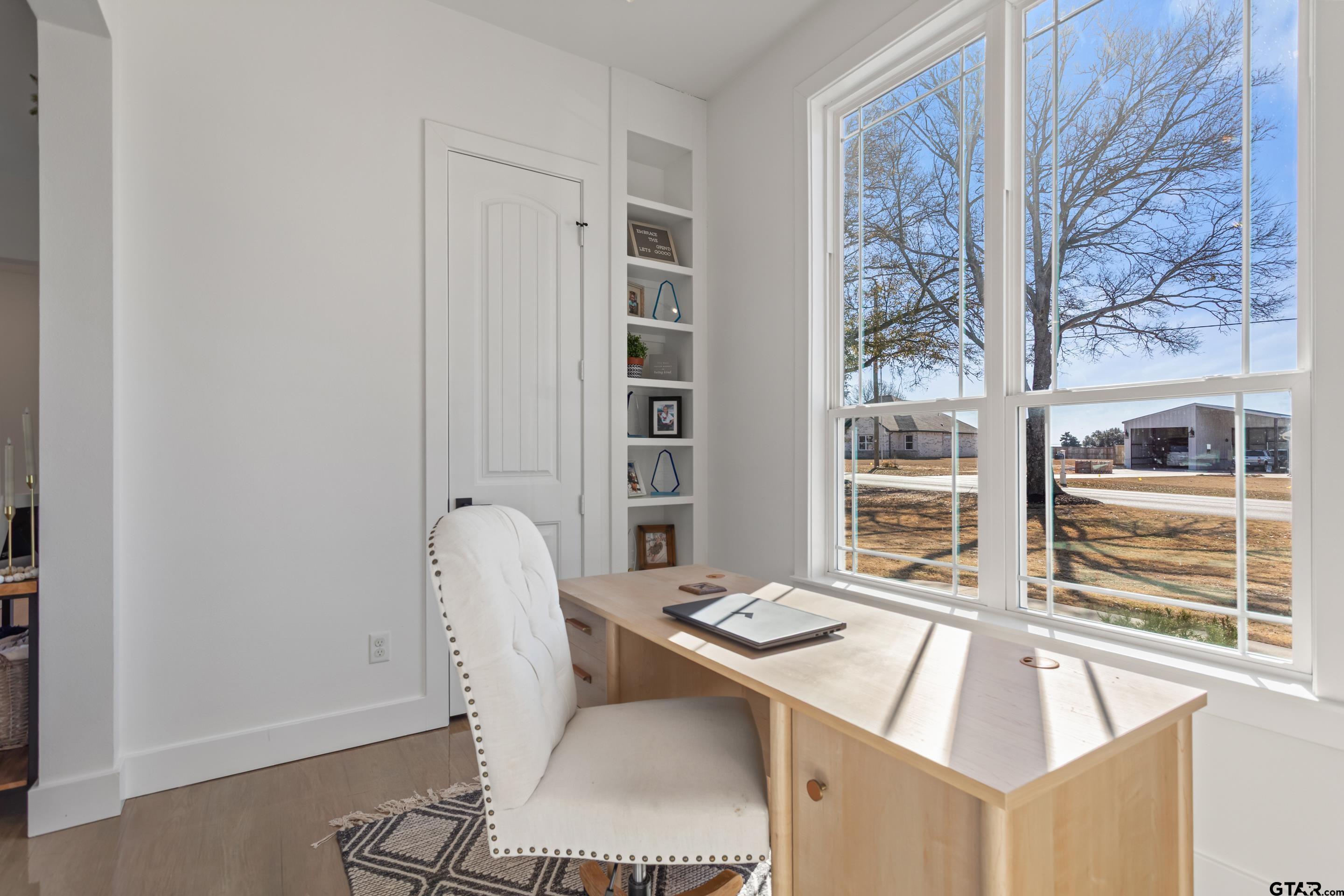 15344 County Road 196 Tyler, TX 75703 - Photo 9 of 48 a dining room with furniture and window