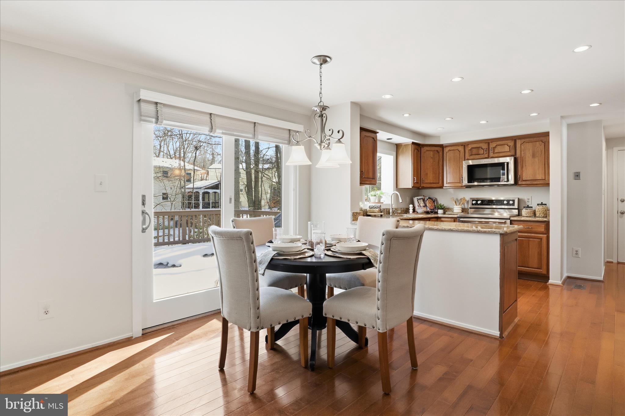 5903 Oak Ridge Court Burke, VA 22015 - Photo 12 of 54 Breakfast nook opens to a two-level deck