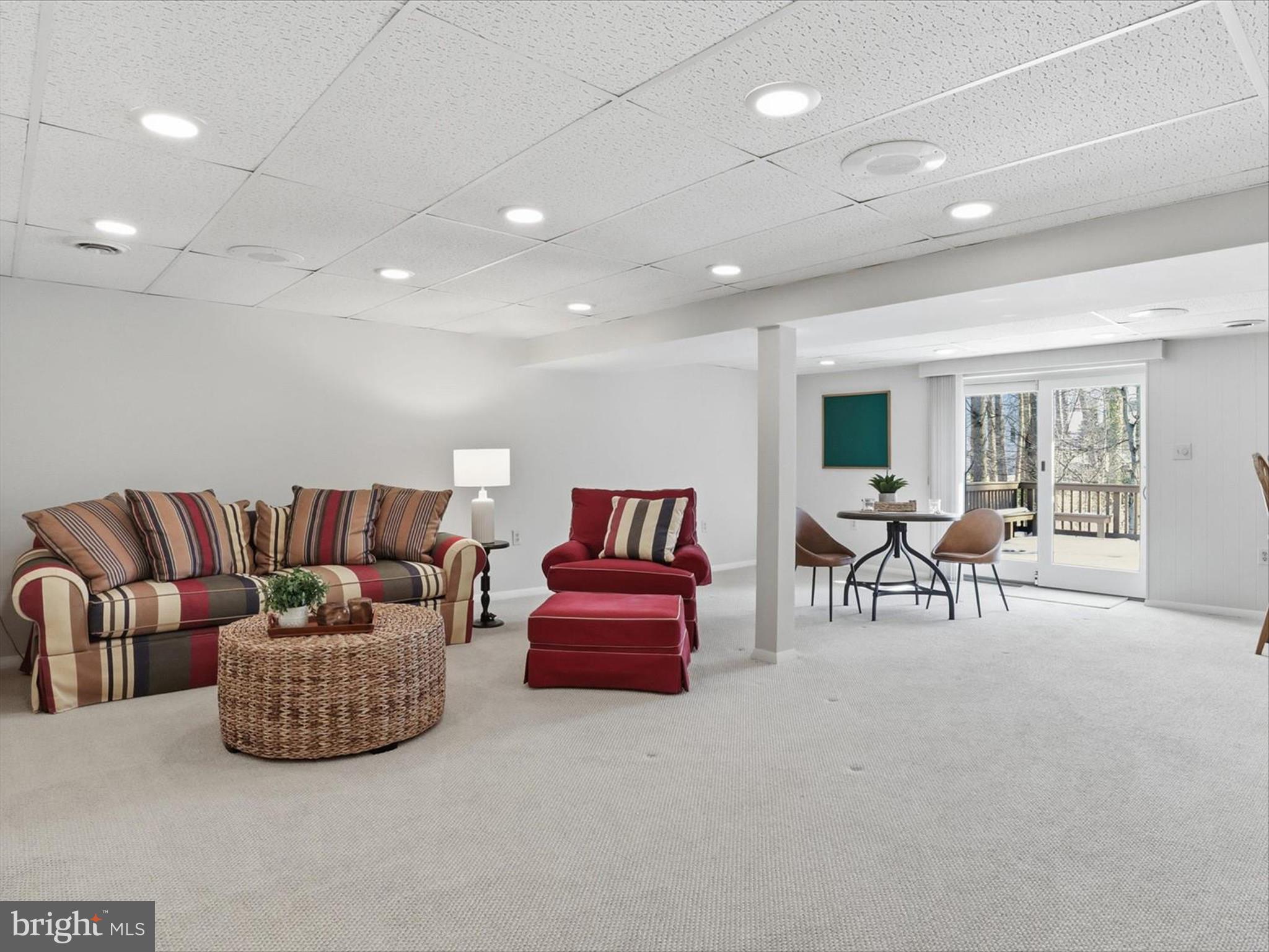 5903 Oak Ridge Court Burke, VA 22015 - Photo 34 of 54 Lower level rec room opening to lower deck