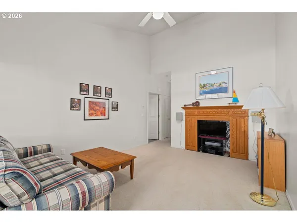 a bedroom with furniture and a fireplace