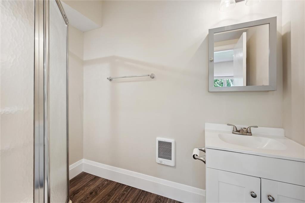 422 Grove Street McKees Rocks, PA 15136 - Photo 13 of 35 Main-level full bath with glass surround shower.
