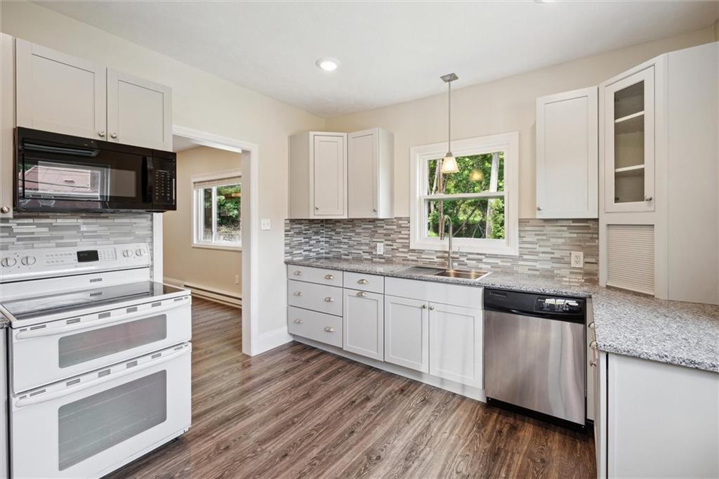 422 Grove Street McKees Rocks, PA 15136 - Photo 8 of 35 The newly renovated kitchen measures approximately 13'x11'. Renovations include