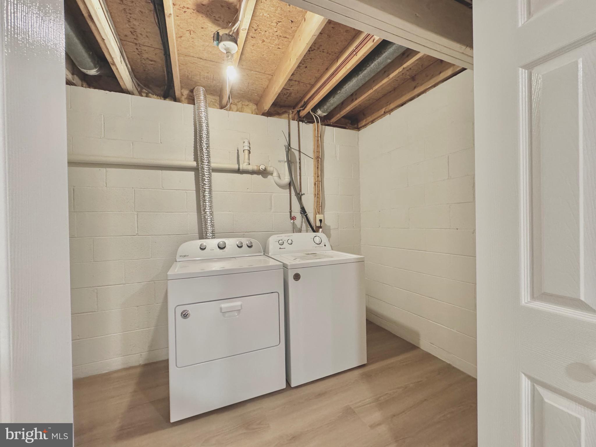 640 Santa Fe Trail Lusby, MD 20657 - Photo 22 of 26 a utility room with dryer and washer