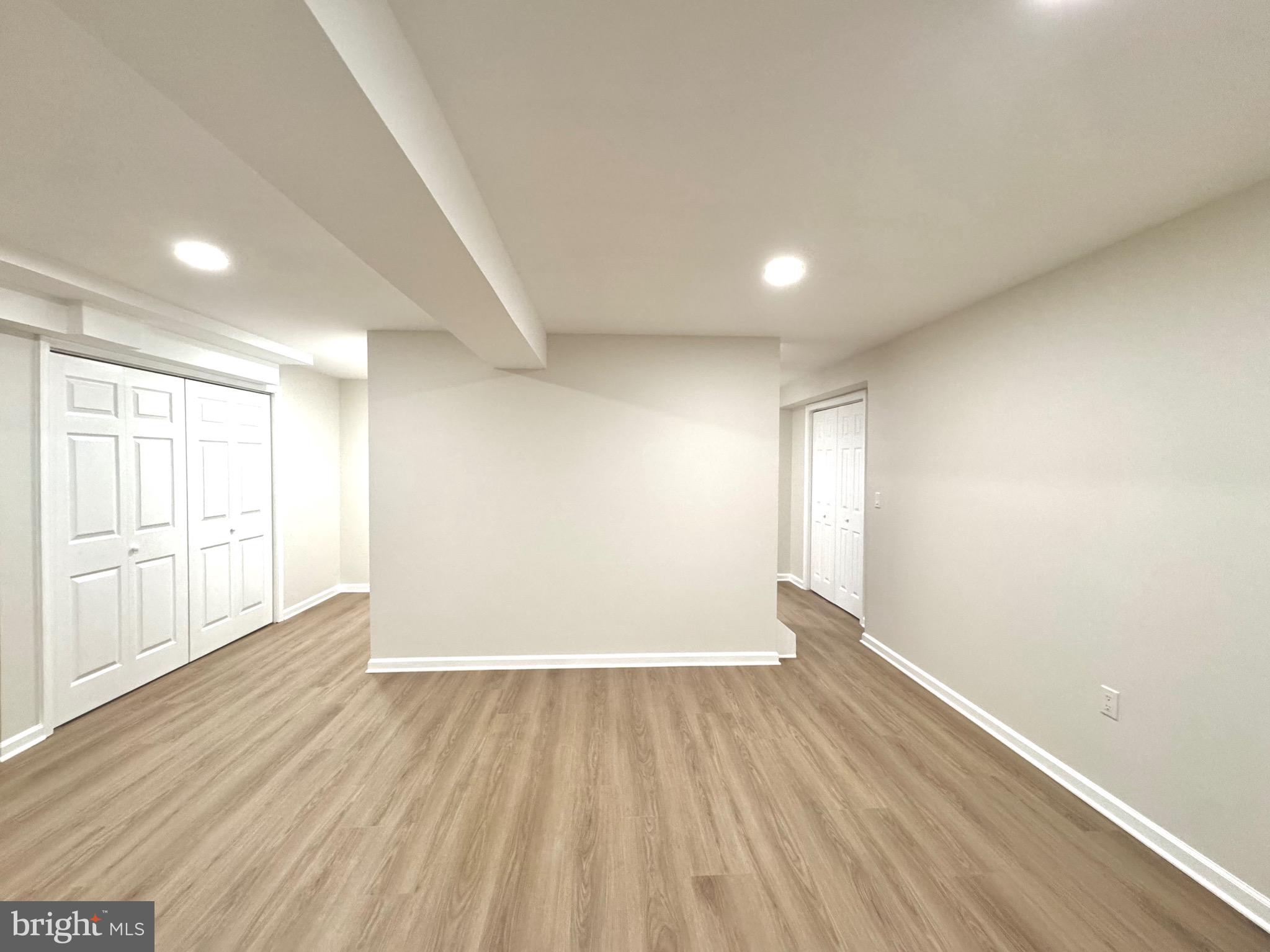 640 Santa Fe Trail Lusby, MD 20657 - Photo 24 of 26 wooden floor in an empty room with a window