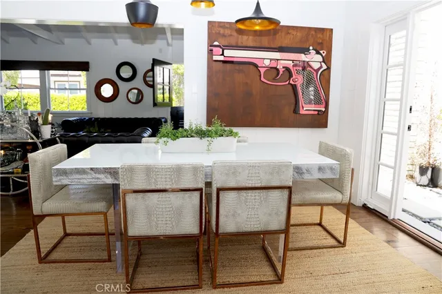 a view of a dinning area with furniture and window