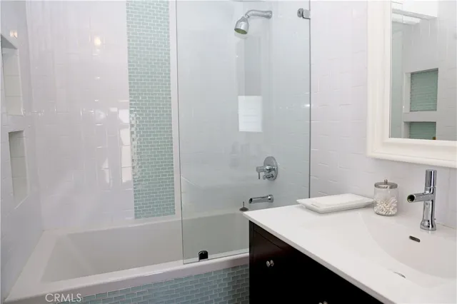 a bathroom with a sink and a bathtub