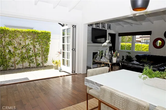 a view of a living room and dining room