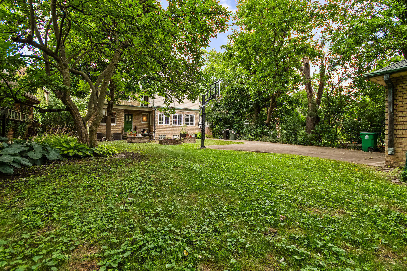 525 Wisner Street Park Ridge, IL 60068 - Photo 4 of 37 a view of house with a big yard and large trees