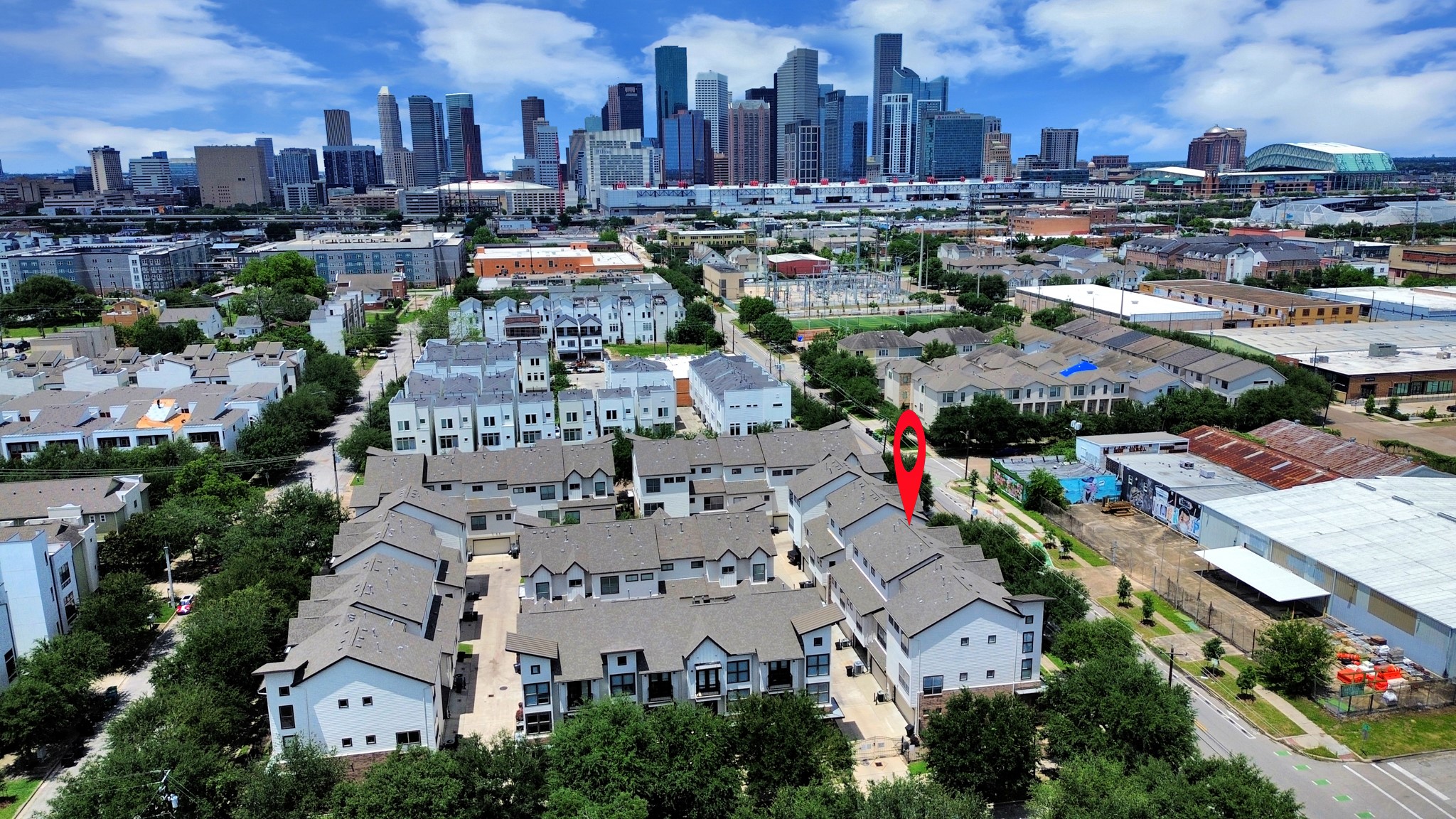 2830 Polk Street Houston, TX 77003 - Photo 19 of 21 Drone photography highlights the property’s placement within the community along with impressive downtown skyline views that add a striking city backdrop to everyday living.