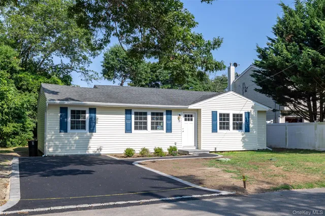 front view of a house and a yard