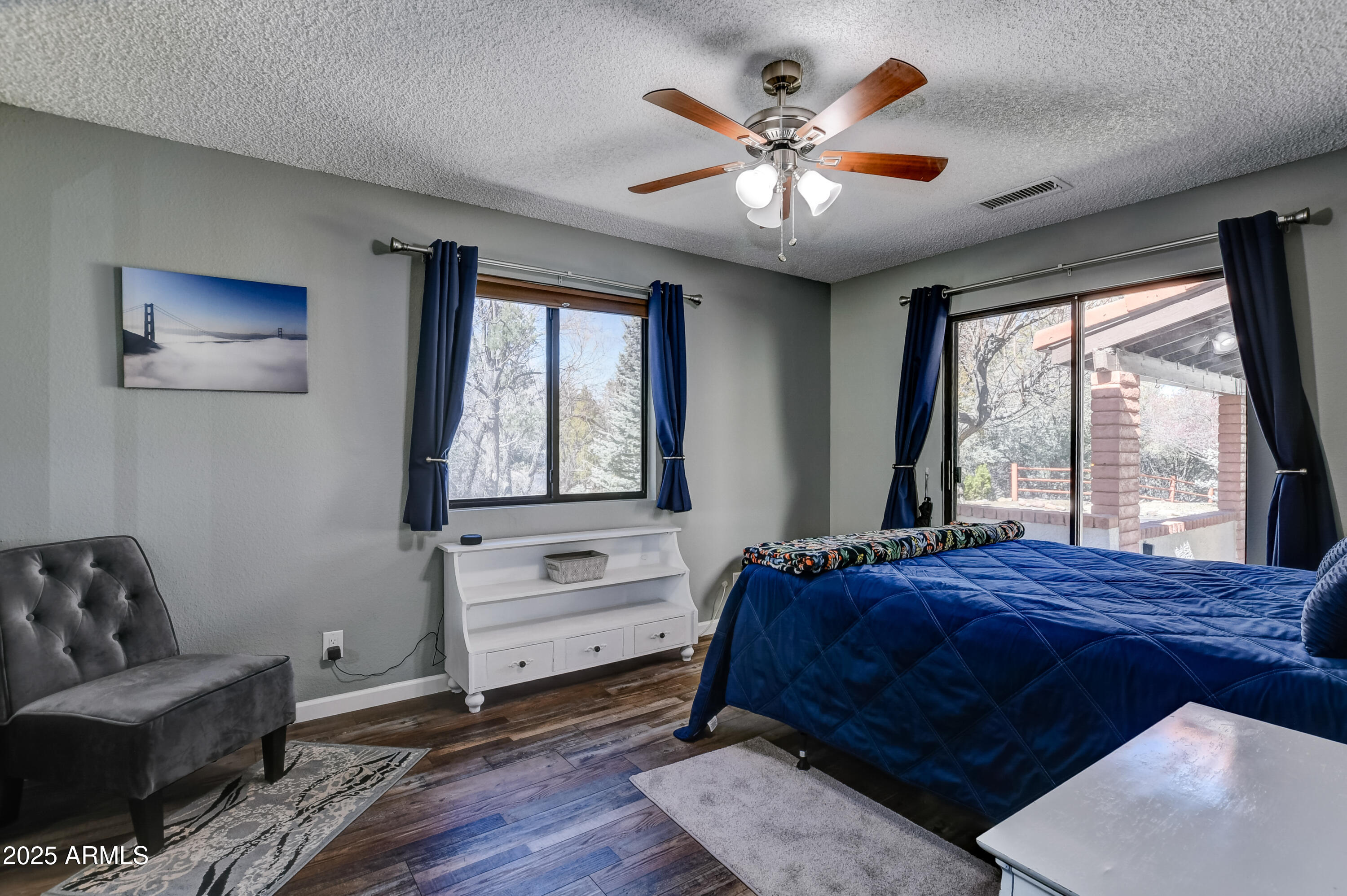 419 Apache Plume Trail Prescott, AZ 86301 - Photo 13 of 21 a bed sitting in a bedroom next to a window