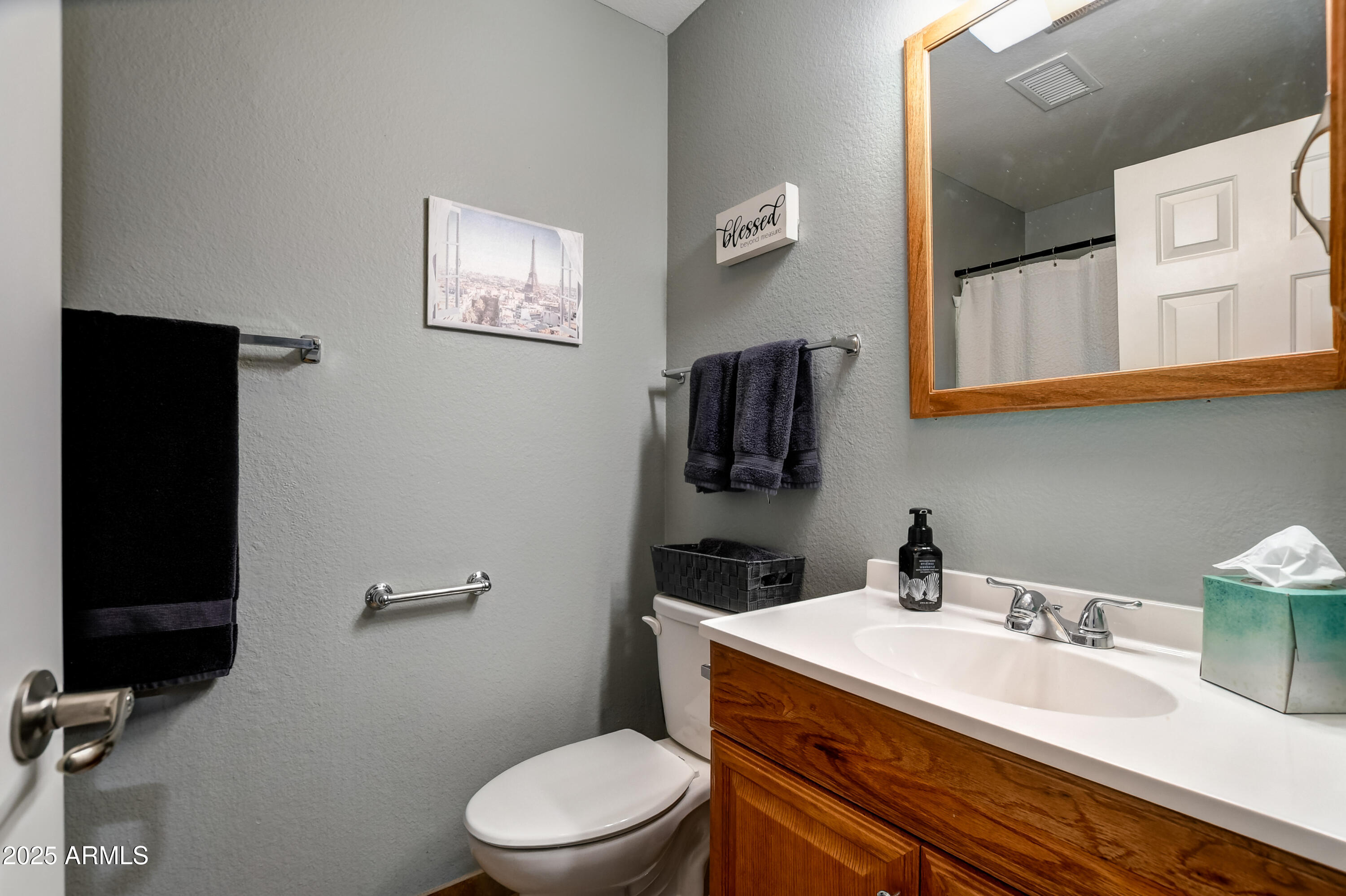 419 Apache Plume Trail Prescott, AZ 86301 - Photo 14 of 21 a bathroom with a granite countertop toilet sink and mirror