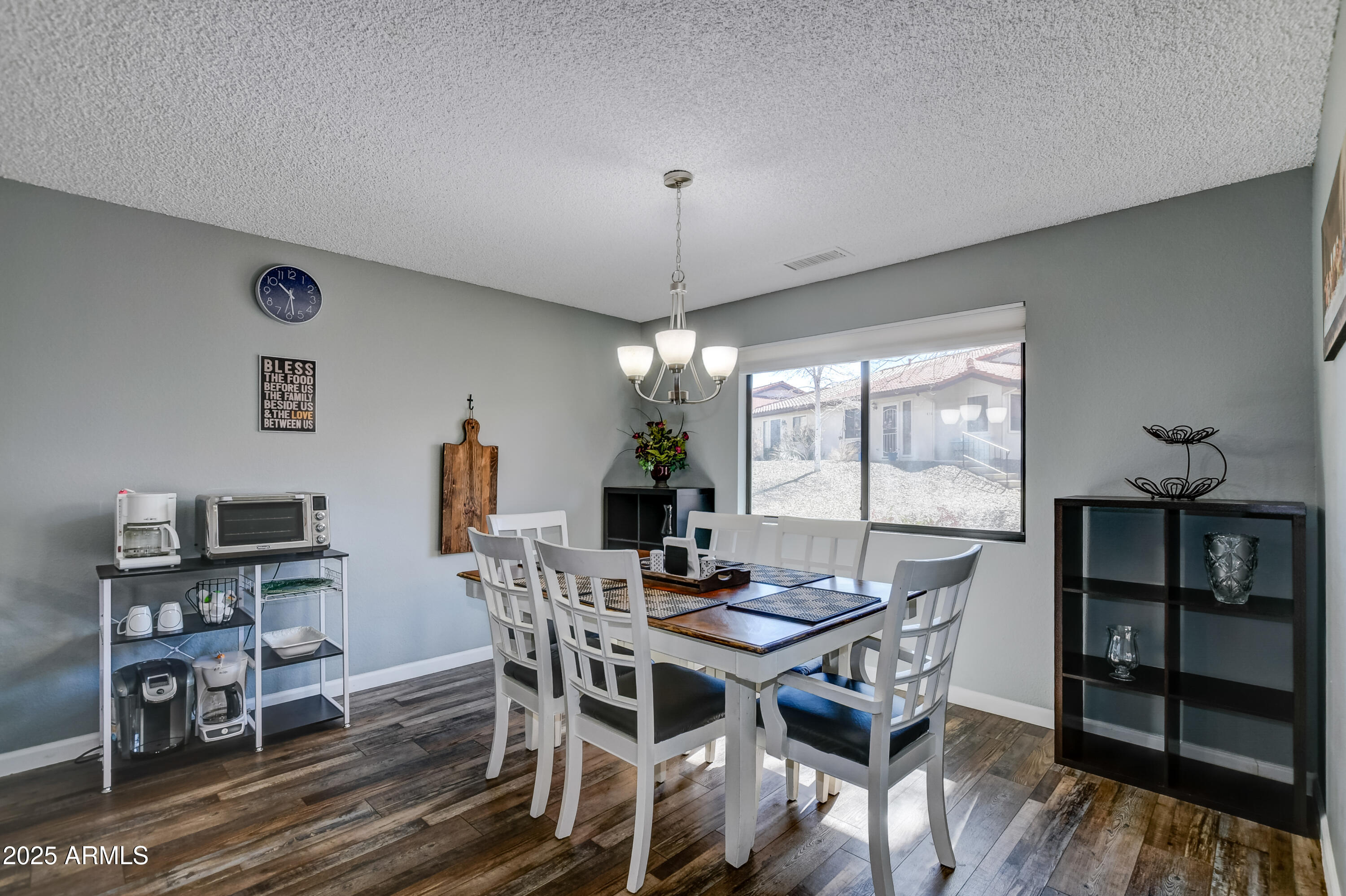 419 Apache Plume Trail Prescott, AZ 86301 - Photo 9 of 21 a view of a dining room with furniture window and wooden floor