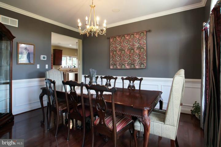 19505 Middletown Road Freeland, MD 21053 - Photo 12 of 30 a view of a dining room with furniture wooden floor and chandelier