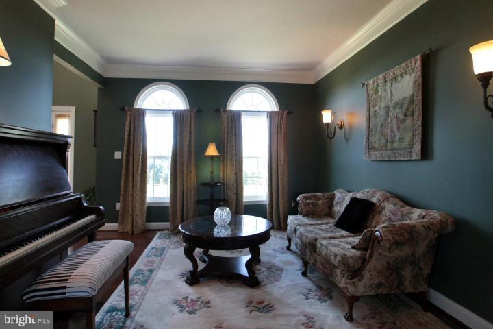 19505 Middletown Road Freeland, MD 21053 - Photo 13 of 30 a living room with furniture and a potted plant