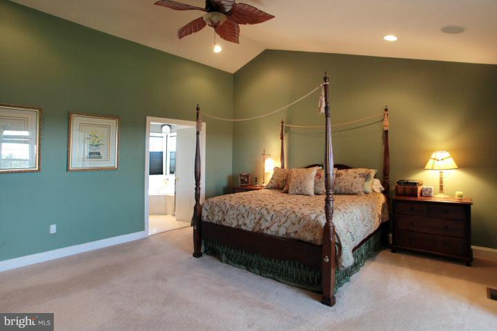 19505 Middletown Road Freeland, MD 21053 - Photo 16 of 30 a bedroom with a bed and a lamp