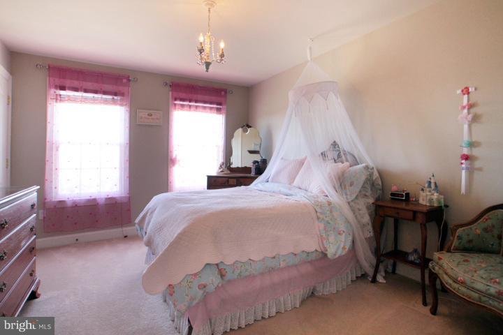 19505 Middletown Road Freeland, MD 21053 - Photo 21 of 30 a bedroom with a bed and a window