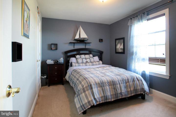 19505 Middletown Road Freeland, MD 21053 - Photo 23 of 30 a bedroom with a bed and window