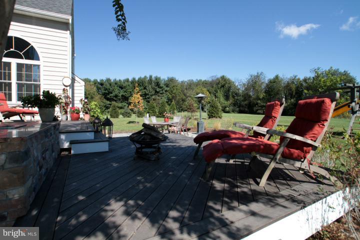 19505 Middletown Road Freeland, MD 21053 - Photo 27 of 30 a view of a patio with table and chairs and potted plants