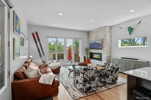 a bedroom with a bed window and a balcony