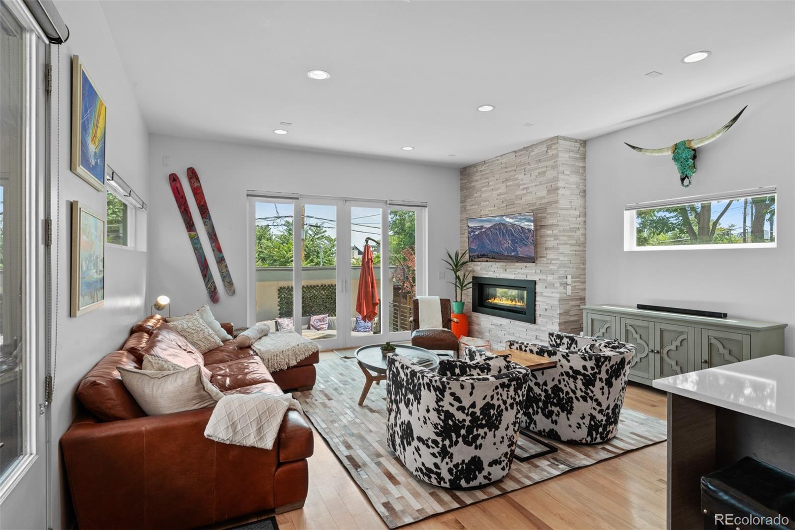 3632 North Pecos Street Denver, CO 80211 - Photo 15 of 47 a living room with furniture fireplace and window
