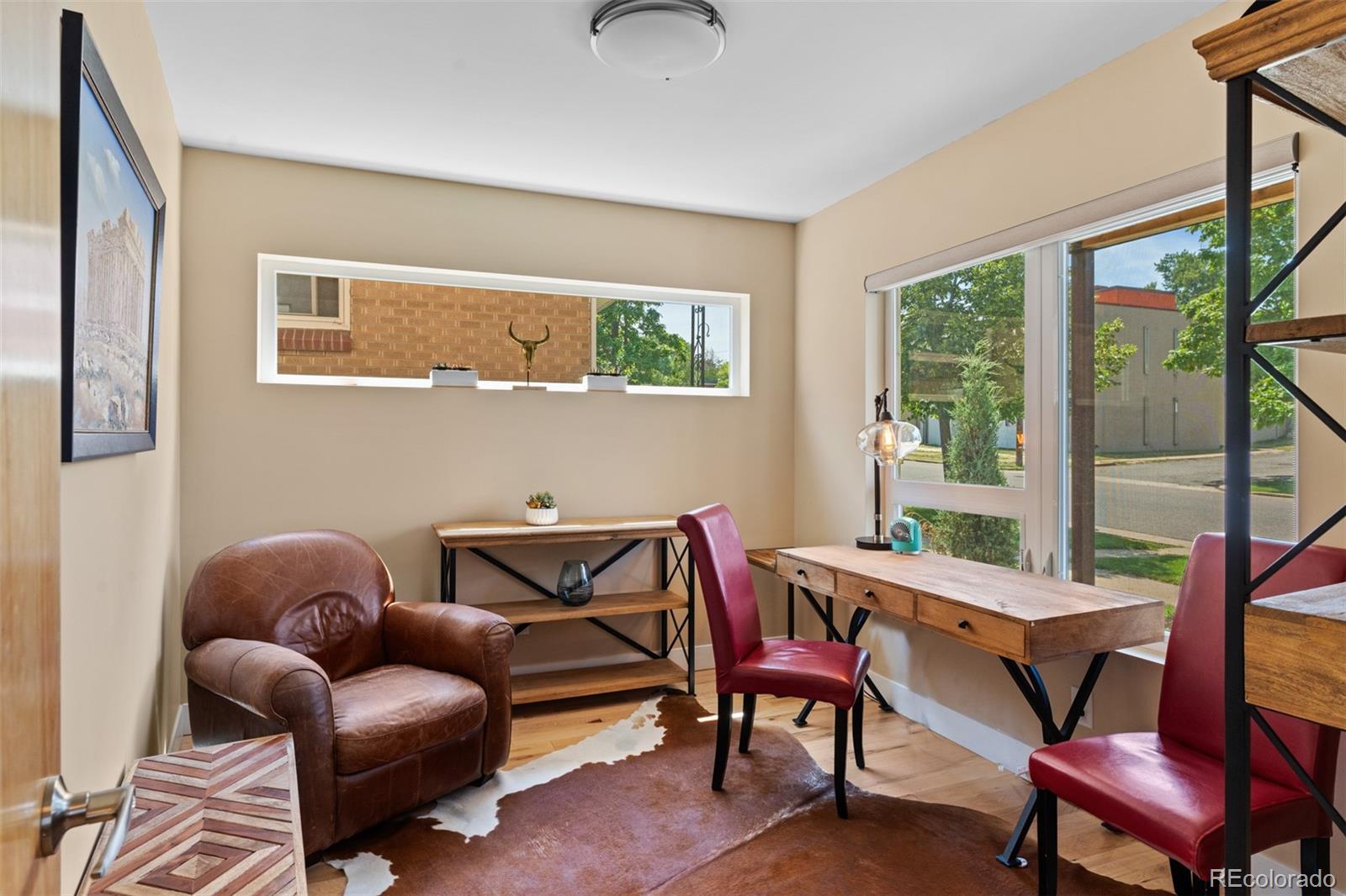 3632 North Pecos Street Denver, CO 80211 - Photo 19 of 47 a reading room with furniture and a window
