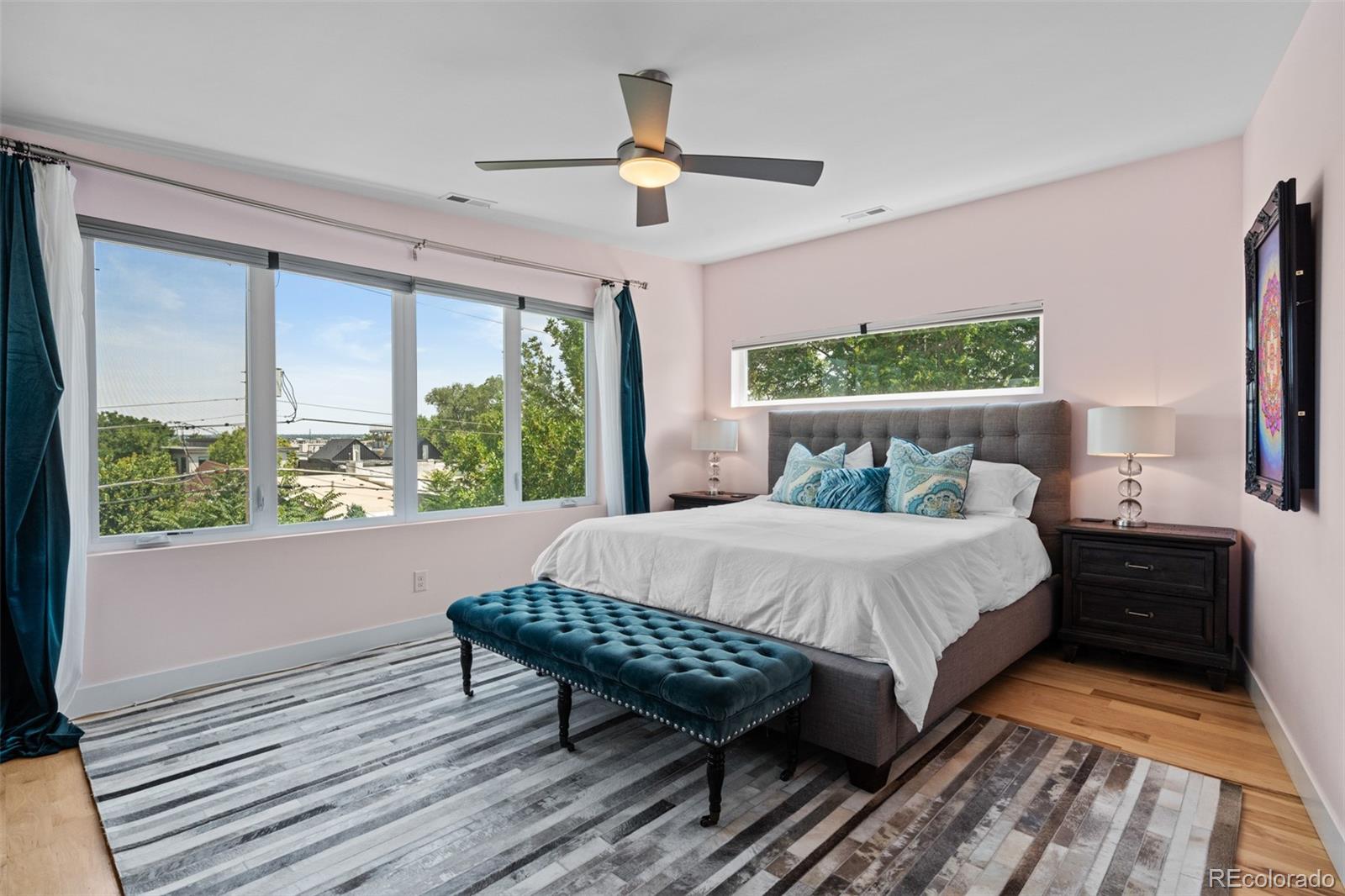 3632 North Pecos Street Denver, CO 80211 - Photo 22 of 47 a bedroom with a bed window and a balcony