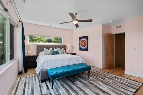 an aerial view of multiple houses with a yard